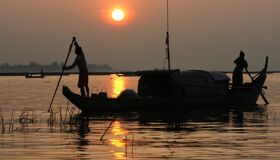 Start your journey with Tonle Sap’s vibrant glow
